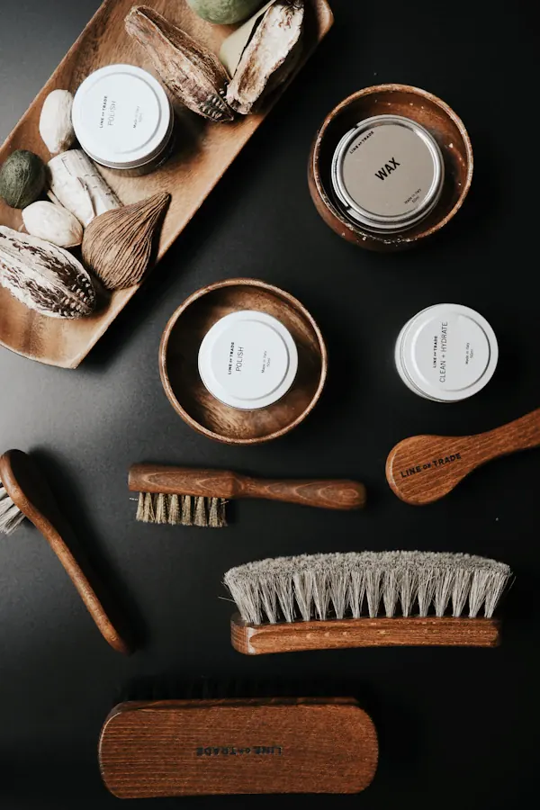 Shoe care waxes and brushes
